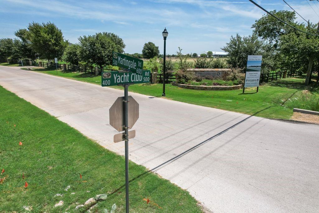 521 Martingale Trail Oak Point, TX 75068 - Photo 24 of 36 a street view with a play ground in front of it