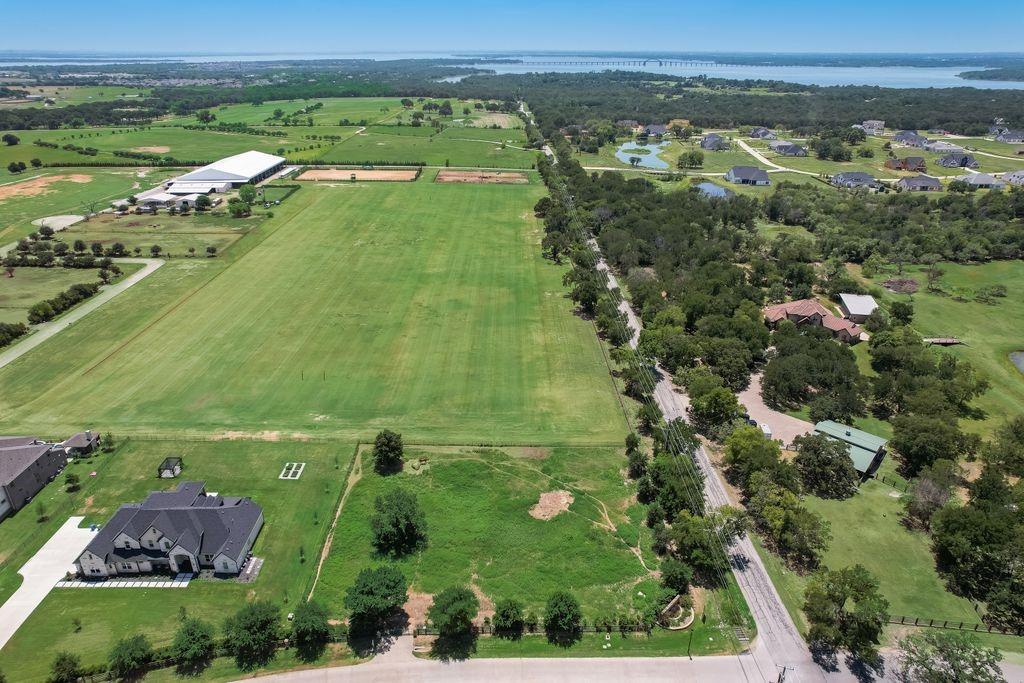 521 Martingale Trail Oak Point, TX 75068 - Photo 8 of 36 an aerial view of residential houses with outdoor space and trees