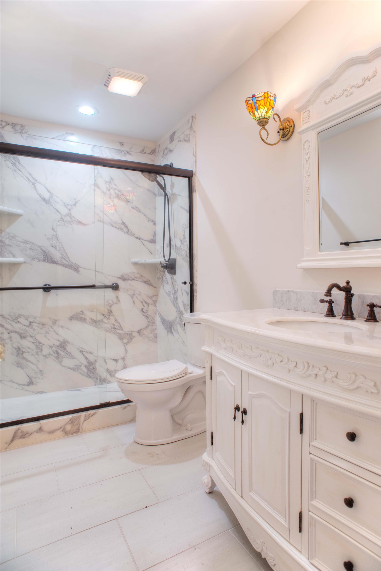 8225 Walnut Grove Road Memphis, TN 38018 - Photo 23 of 29 a bathroom with a sink a toilet and shower