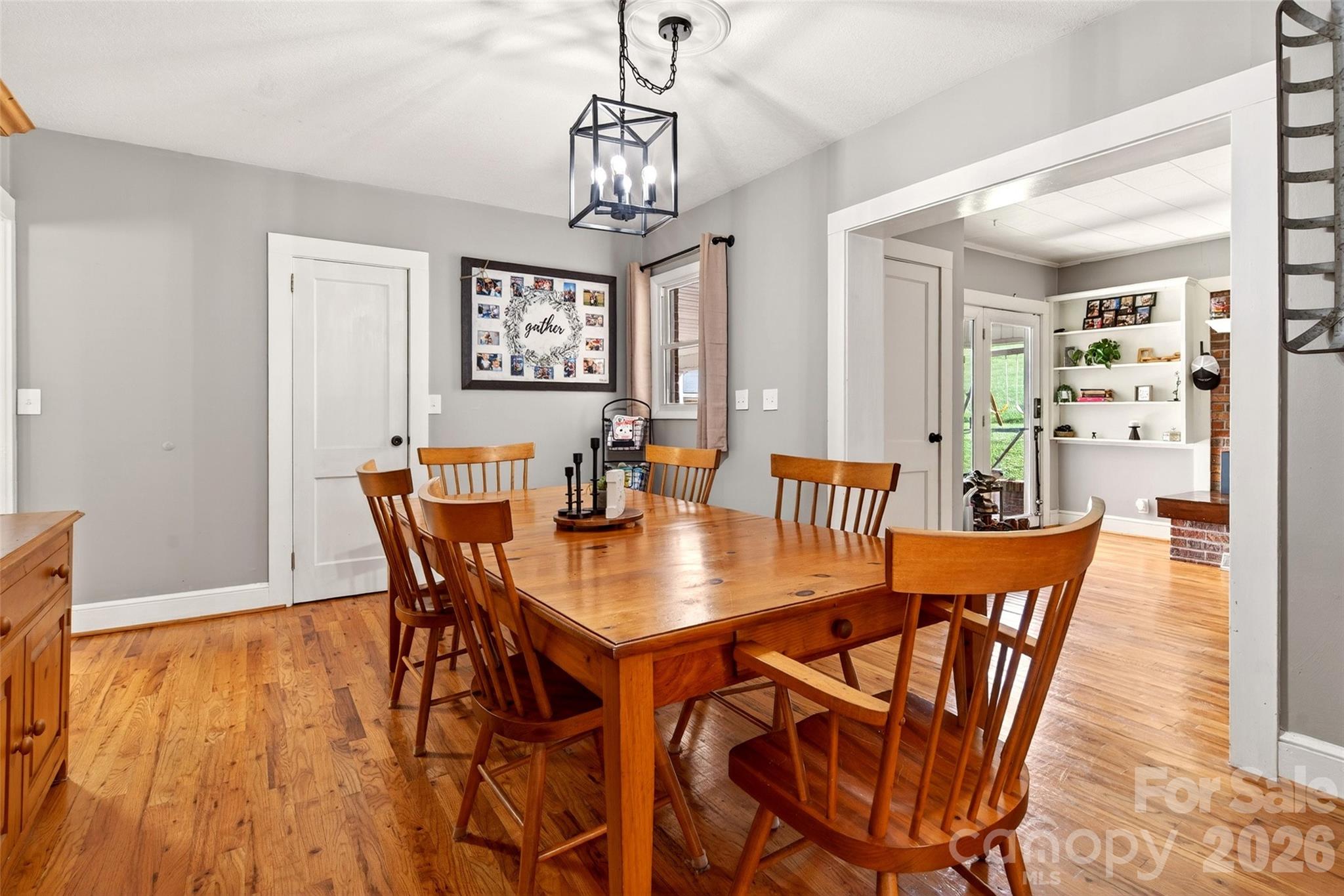 1511 White Oak Road Bakersville, NC 28705 - Photo 11 of 33 a view of a dining room with furniture window and wooden floor