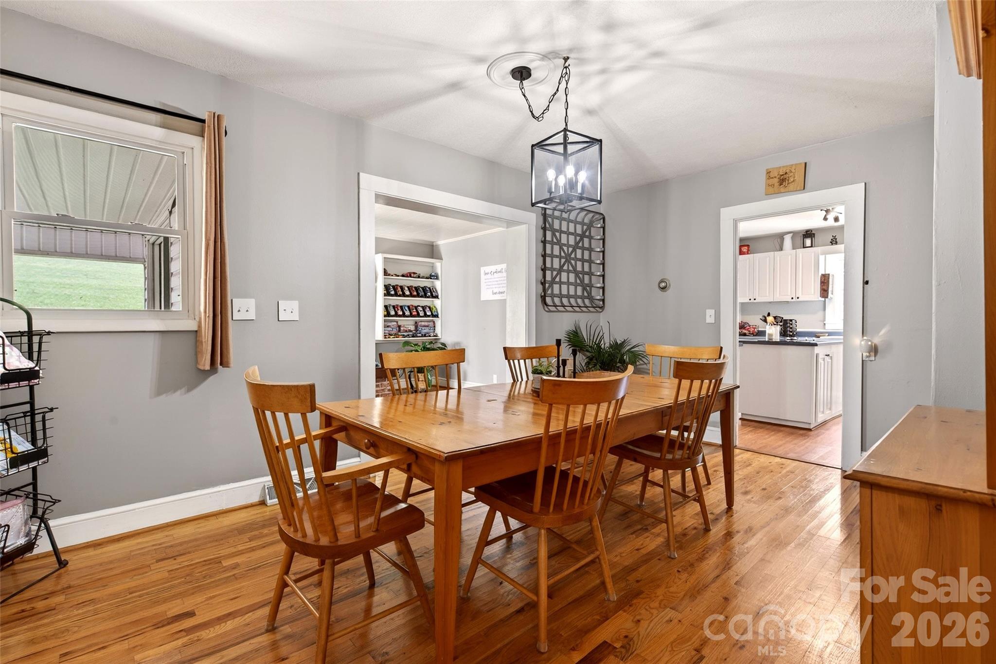 1511 White Oak Road Bakersville, NC 28705 - Photo 12 of 33 a view of a dining room with furniture window and wooden floor