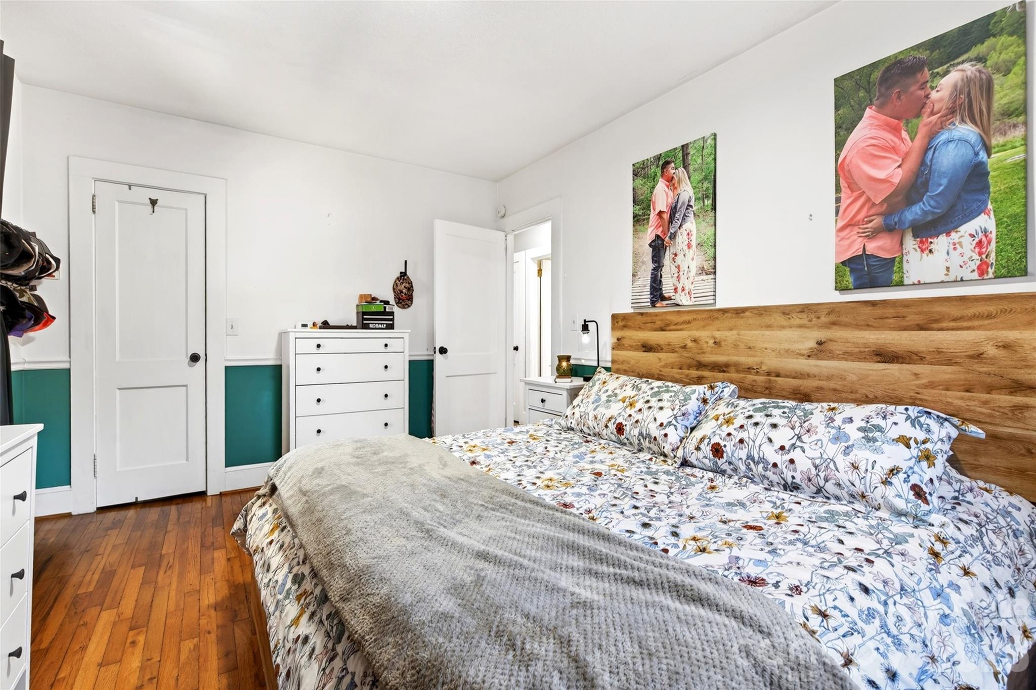 1511 White Oak Road Bakersville, NC 28705 - Photo 13 of 33 a bedroom with a bed and painting on the wall