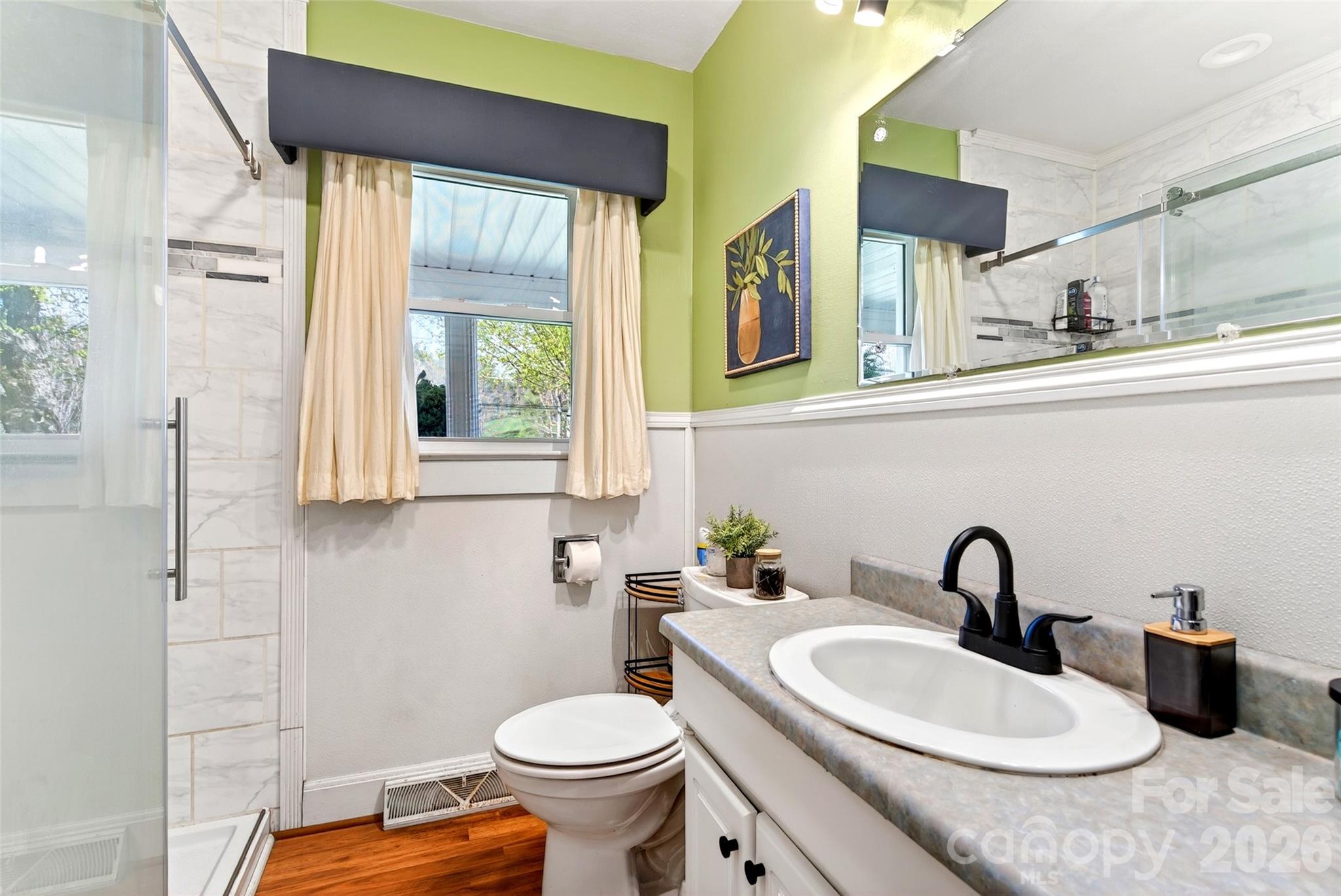 1511 White Oak Road Bakersville, NC 28705 - Photo 15 of 33 a bathroom with a sink and a toilet