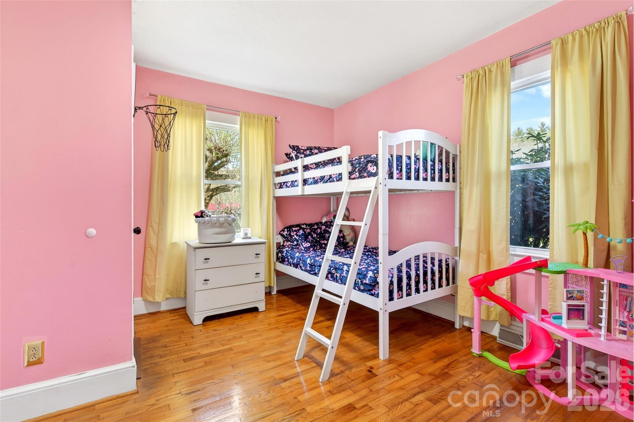 1511 White Oak Road Bakersville, NC 28705 - Photo 17 of 33 a bedroom with furniture and a window