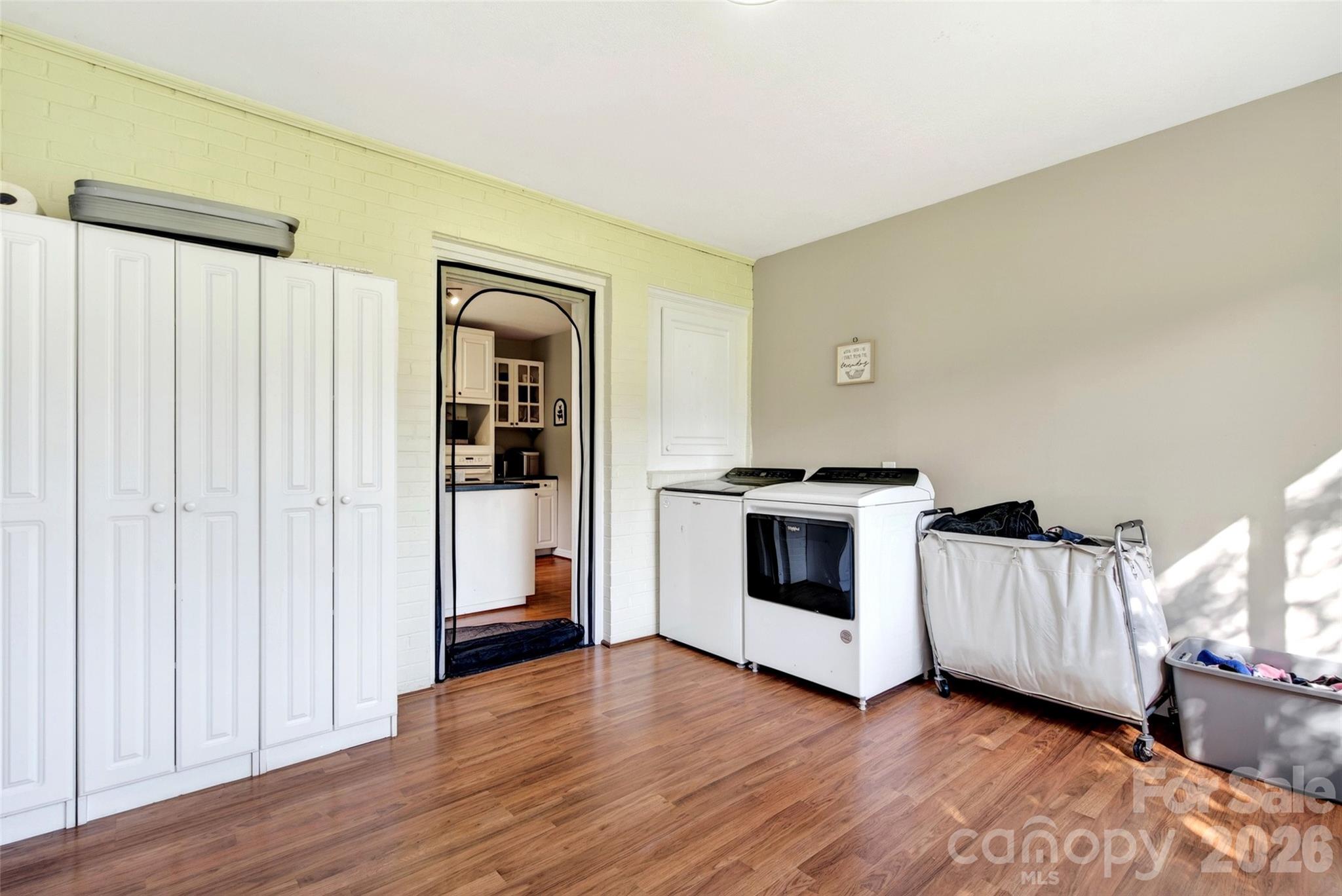 1511 White Oak Road Bakersville, NC 28705 - Photo 20 of 33 a view of a kitchen with wooden floor and electronic appliances
