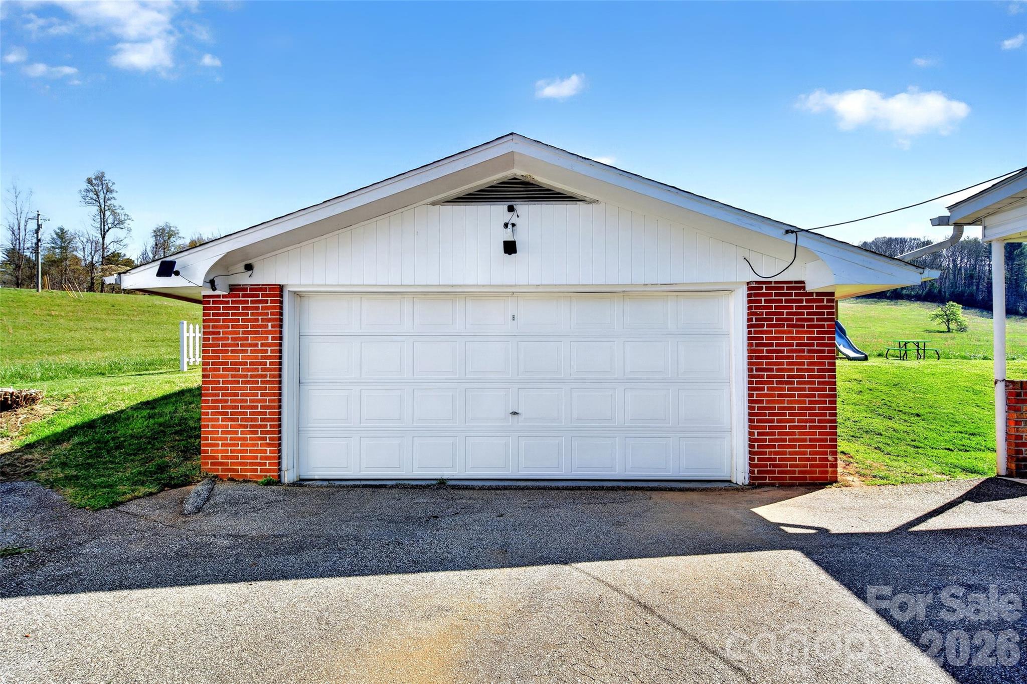 1511 White Oak Road Bakersville, NC 28705 - Photo 26 of 33 a front view of a house with a yard