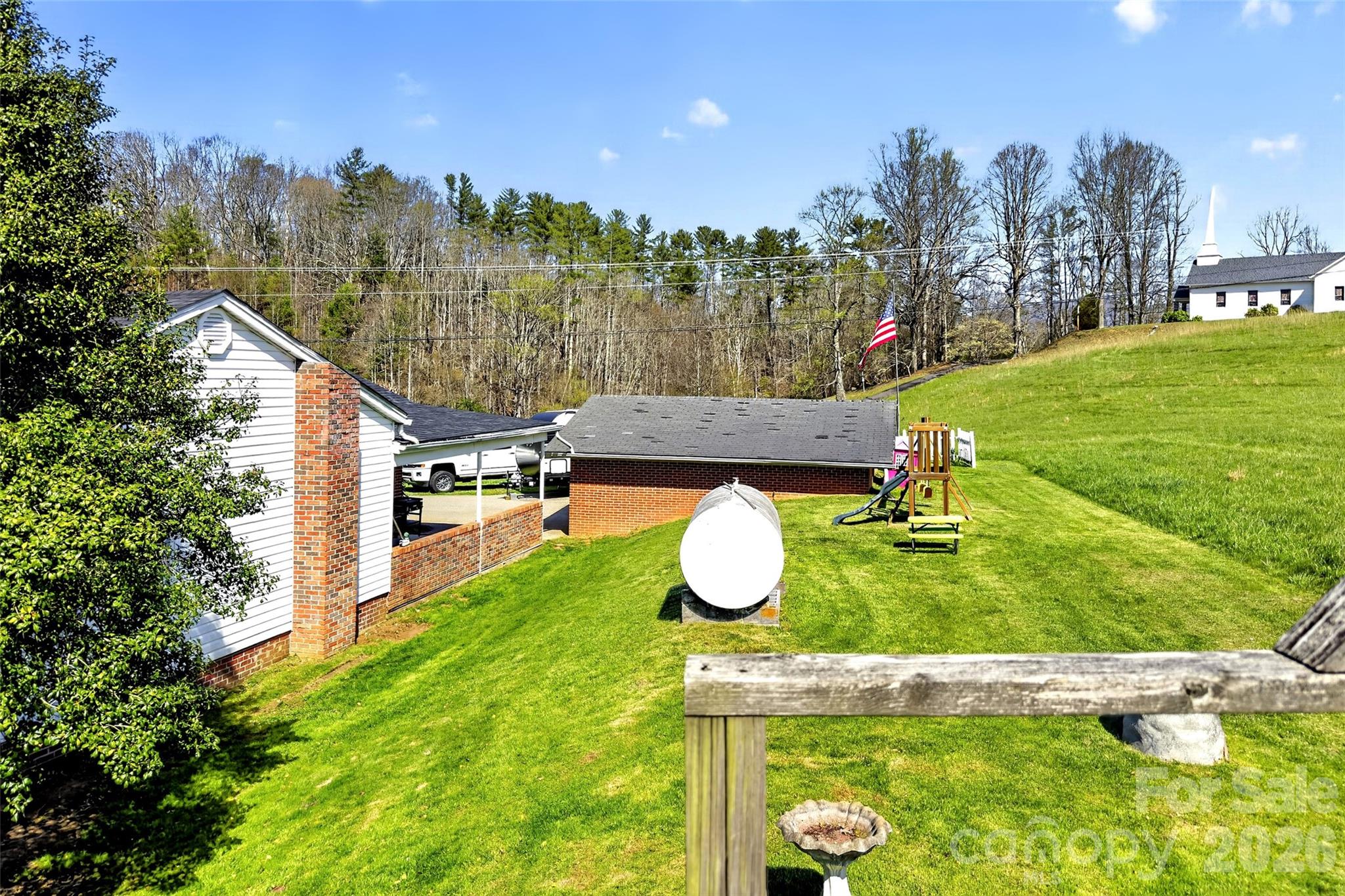 1511 White Oak Road Bakersville, NC 28705 - Photo 27 of 33 a view of a garden with a house