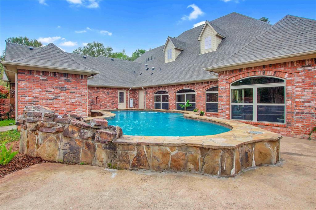 8350 FM 346 Flint, TX 75762 - Photo 2 of 39 a view of a house with a yard and sitting area