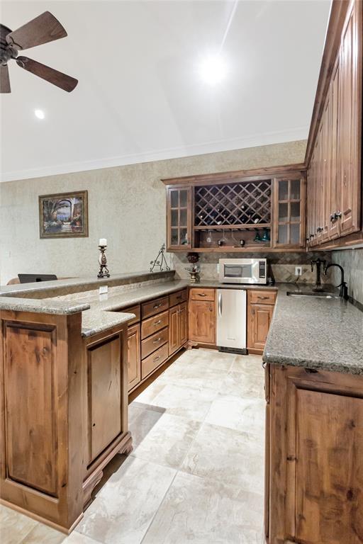 8350 FM 346 Flint, TX 75762 - Photo 27 of 39 a kitchen with stainless steel appliances granite countertop a stove sink and cabinets