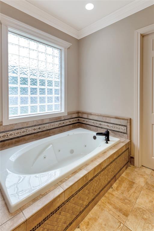 8350 FM 346 Flint, TX 75762 - Photo 33 of 39 a bathroom with a bathtub and next to a window