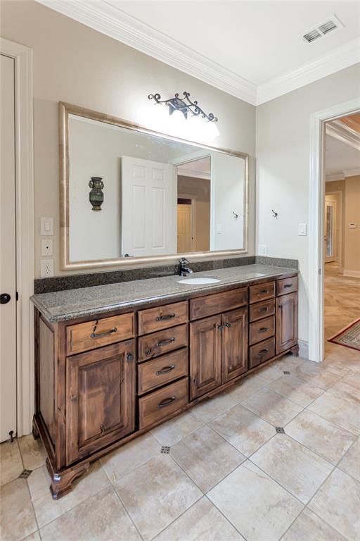 8350 FM 346 Flint, TX 75762 - Photo 34 of 39 a spacious bathroom with a granite countertop sink and a mirror