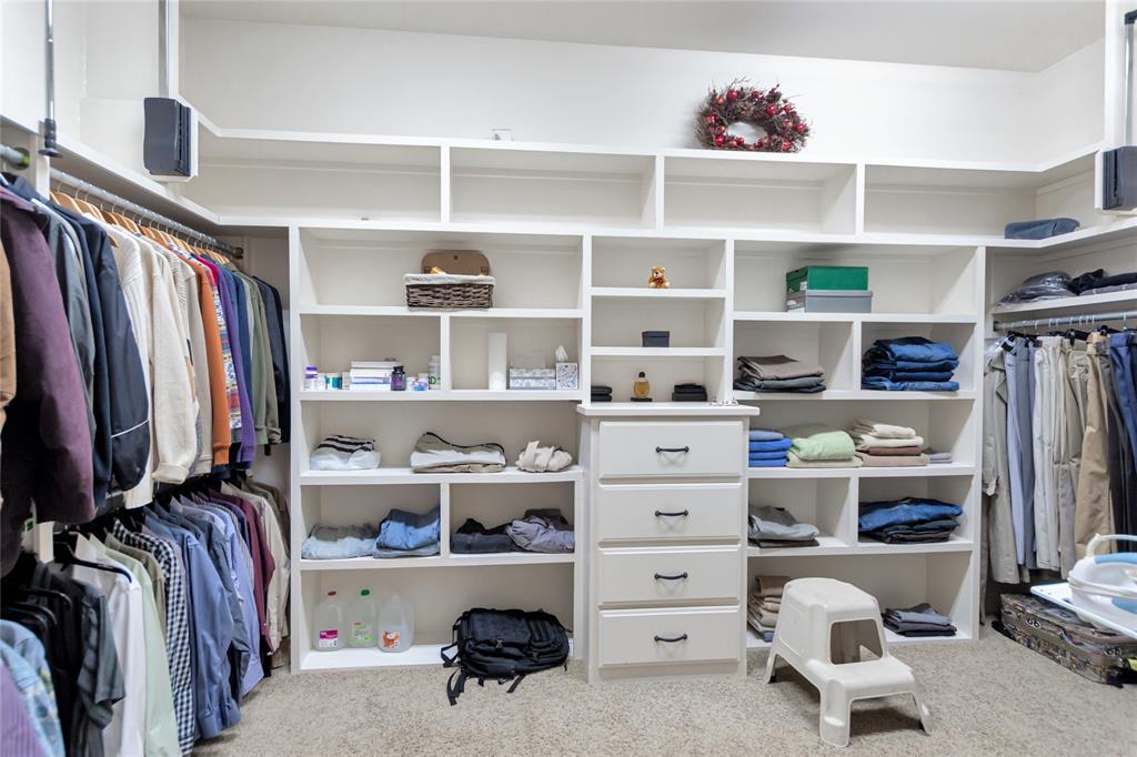 8350 FM 346 Flint, TX 75762 - Photo 35 of 39 a view of walk in closet with clothes and shoes