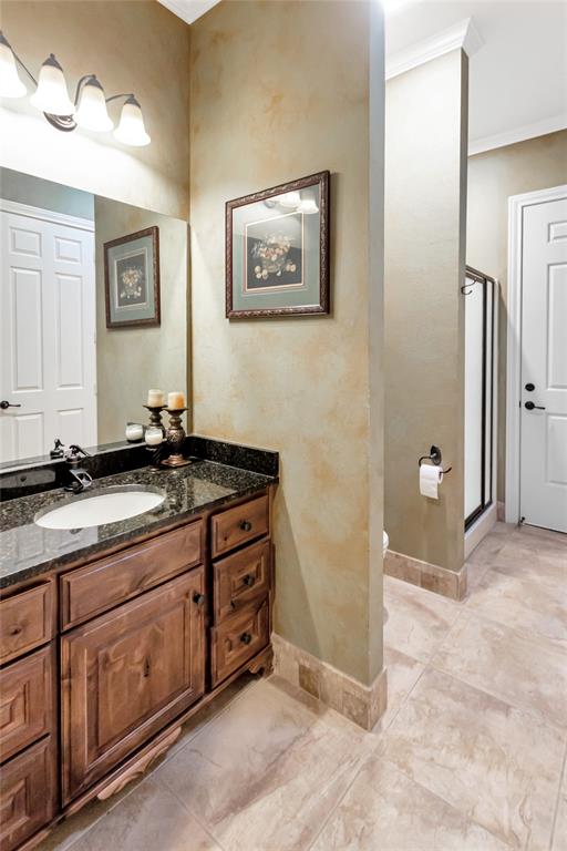 8350 FM 346 Flint, TX 75762 - Photo 36 of 39 a spacious bathroom with a granite countertop sink a mirror and a