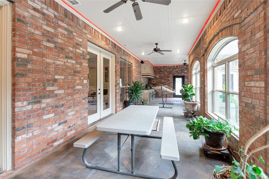 8350 FM 346 Flint, TX 75762 - Photo 37 of 39 a view of a porch with furniture and a potted plant
