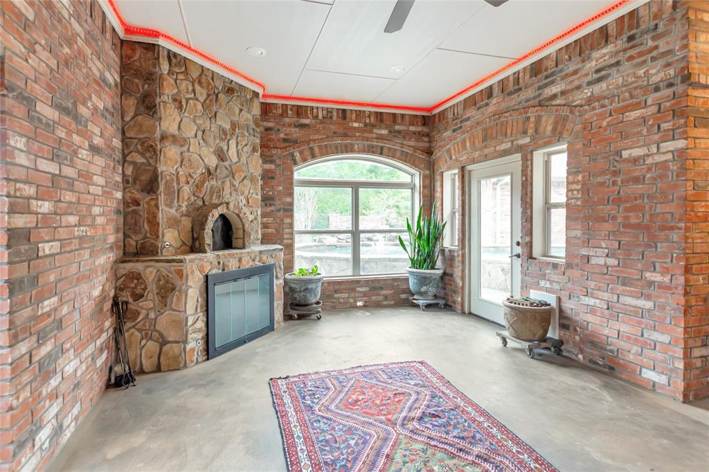 8350 FM 346 Flint, TX 75762 - Photo 39 of 39 a living room with furniture and a fireplace