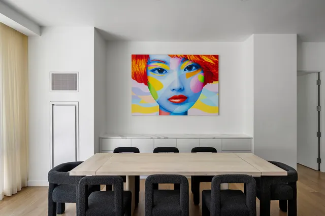 a living room with furniture and flat screen tv