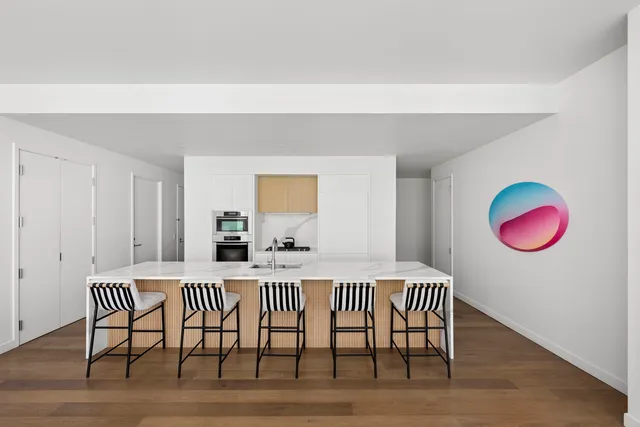 a room with a table and chairs