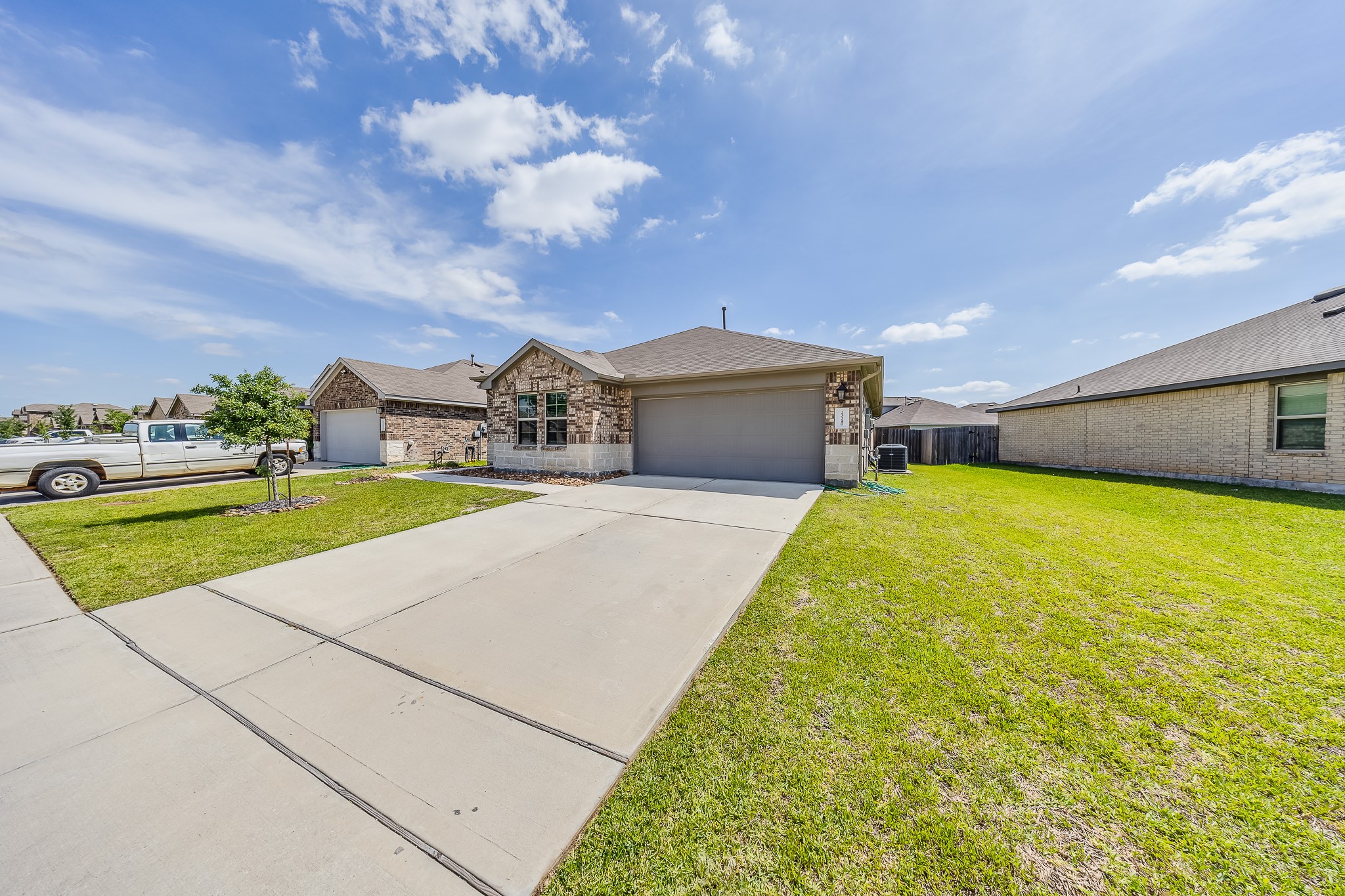 23210 Barberry Crk Trail Spring, TX 77373 - Photo 26 of 33 a swimming pool with a outdoor seating and yard