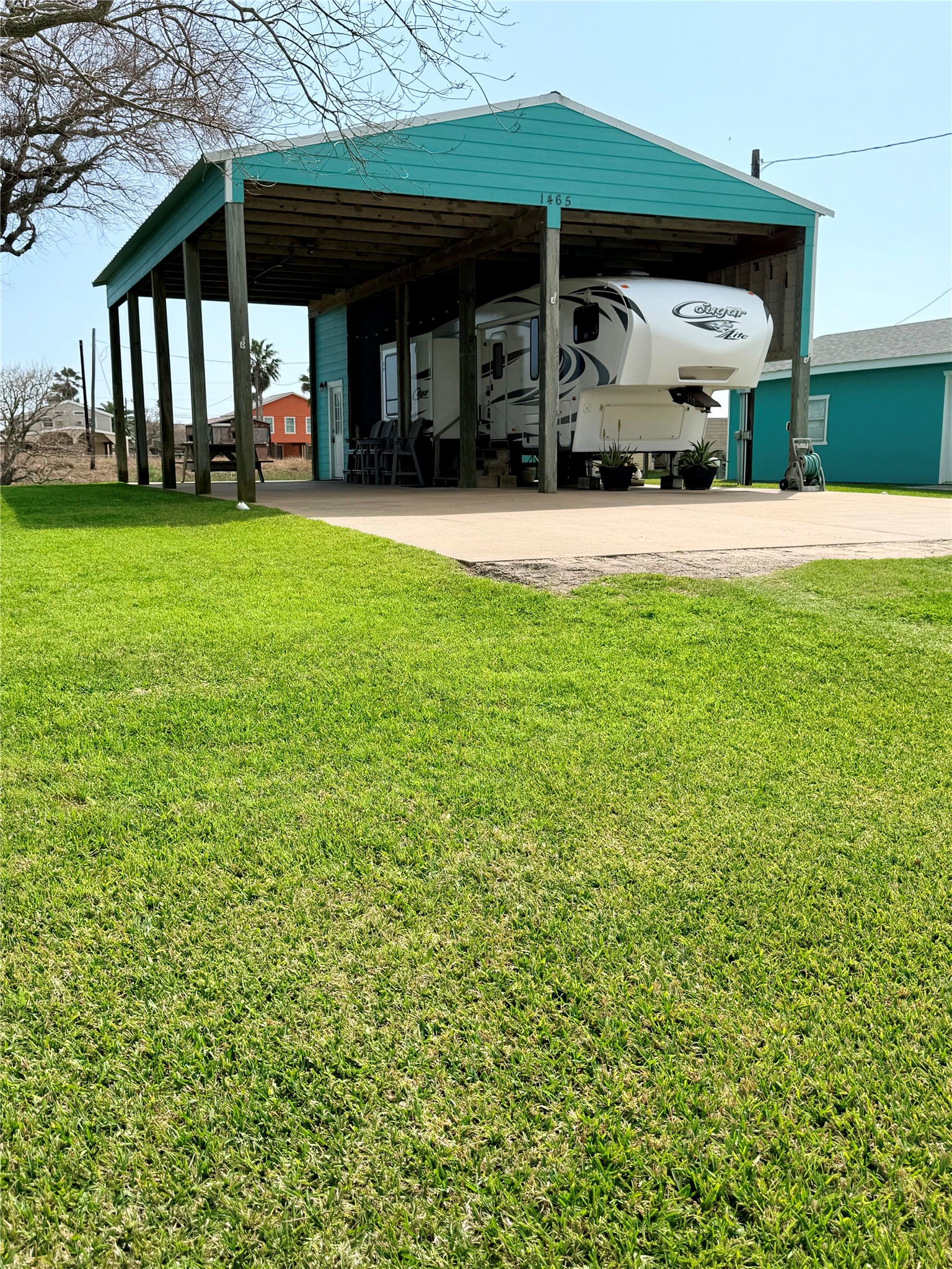 Lot 49-blk Sec 3 County Road 201 Sargent, TX 77414 - Photo 11 of 30 a view of a house with yard and porch