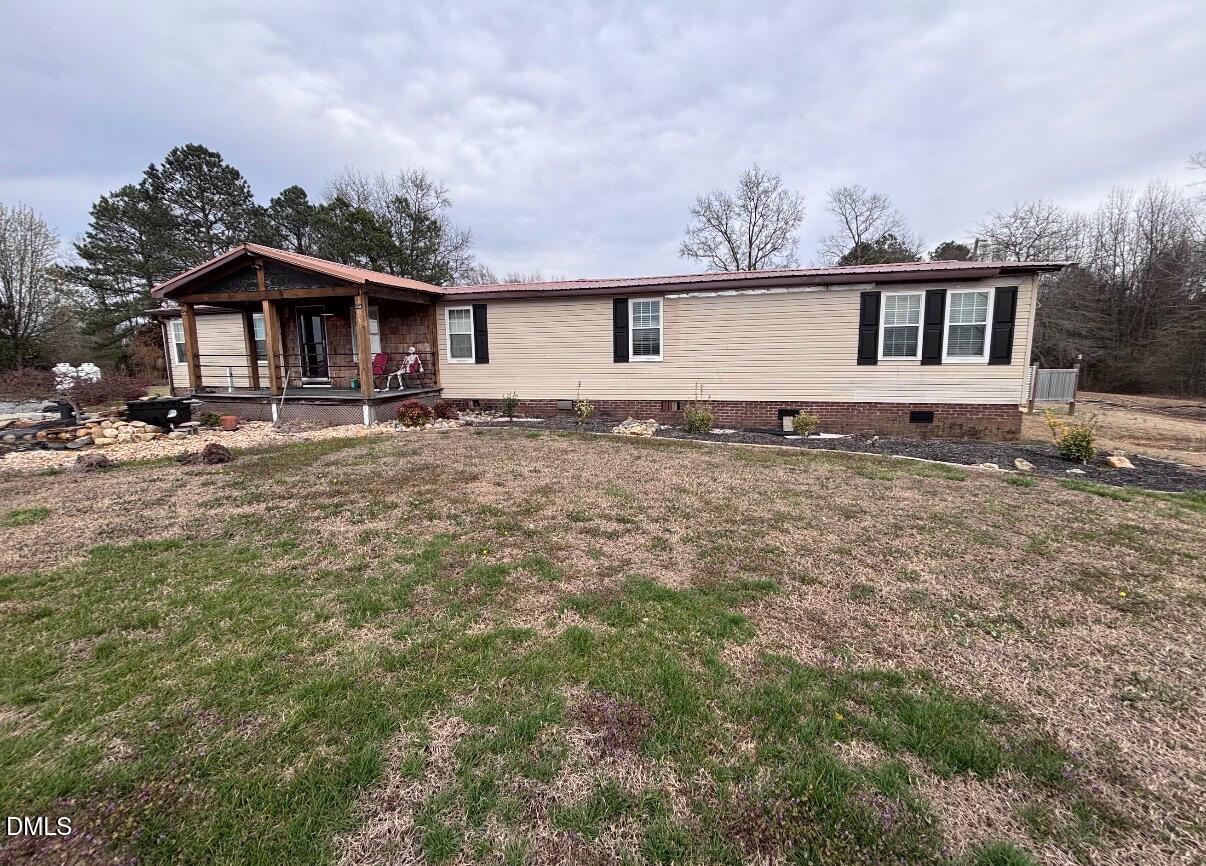 618 Bogue Road Fremont, NC 27830 - Photo 1 of 1 a front view of a house with yard
