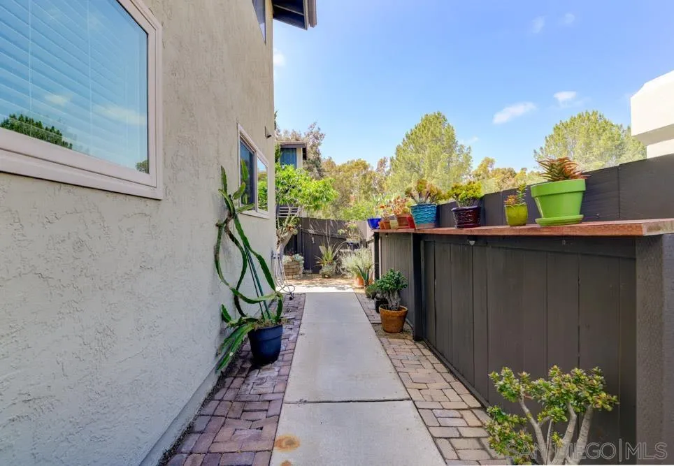 6357 Rancho Mission Road, Unit 1 San Diego, CA 92108 - Photo 20 of 28 a view of entryway with wooden floor