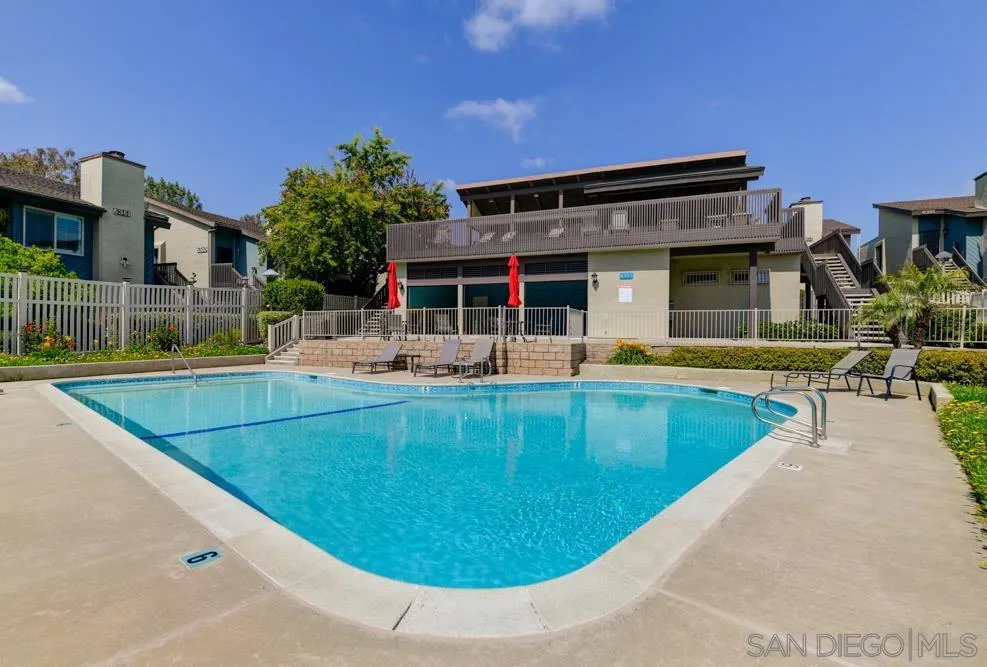 6357 Rancho Mission Road, Unit 1 San Diego, CA 92108 - Photo 25 of 28 a view of a house with swimming pool