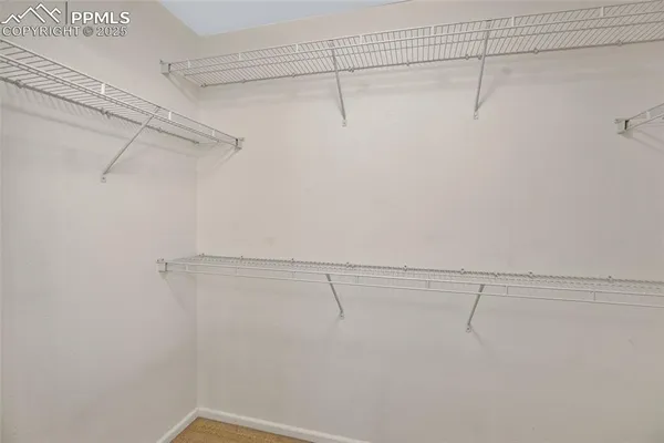 a view of a room with racks on the wall