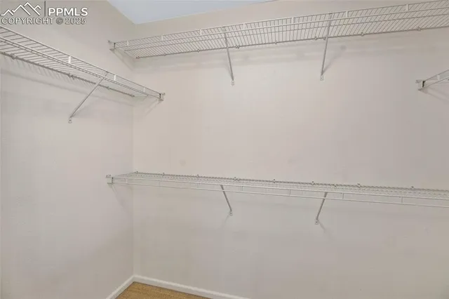 a view of a room with racks on the wall