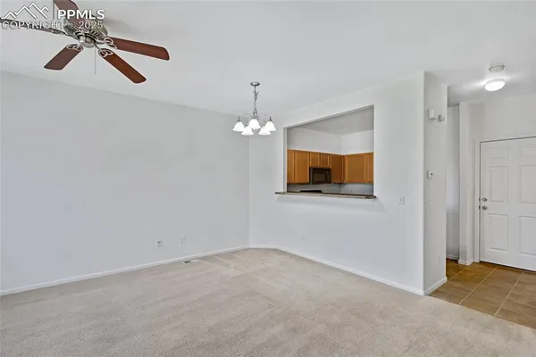 a view of a chandelier fan and a chandelier fan