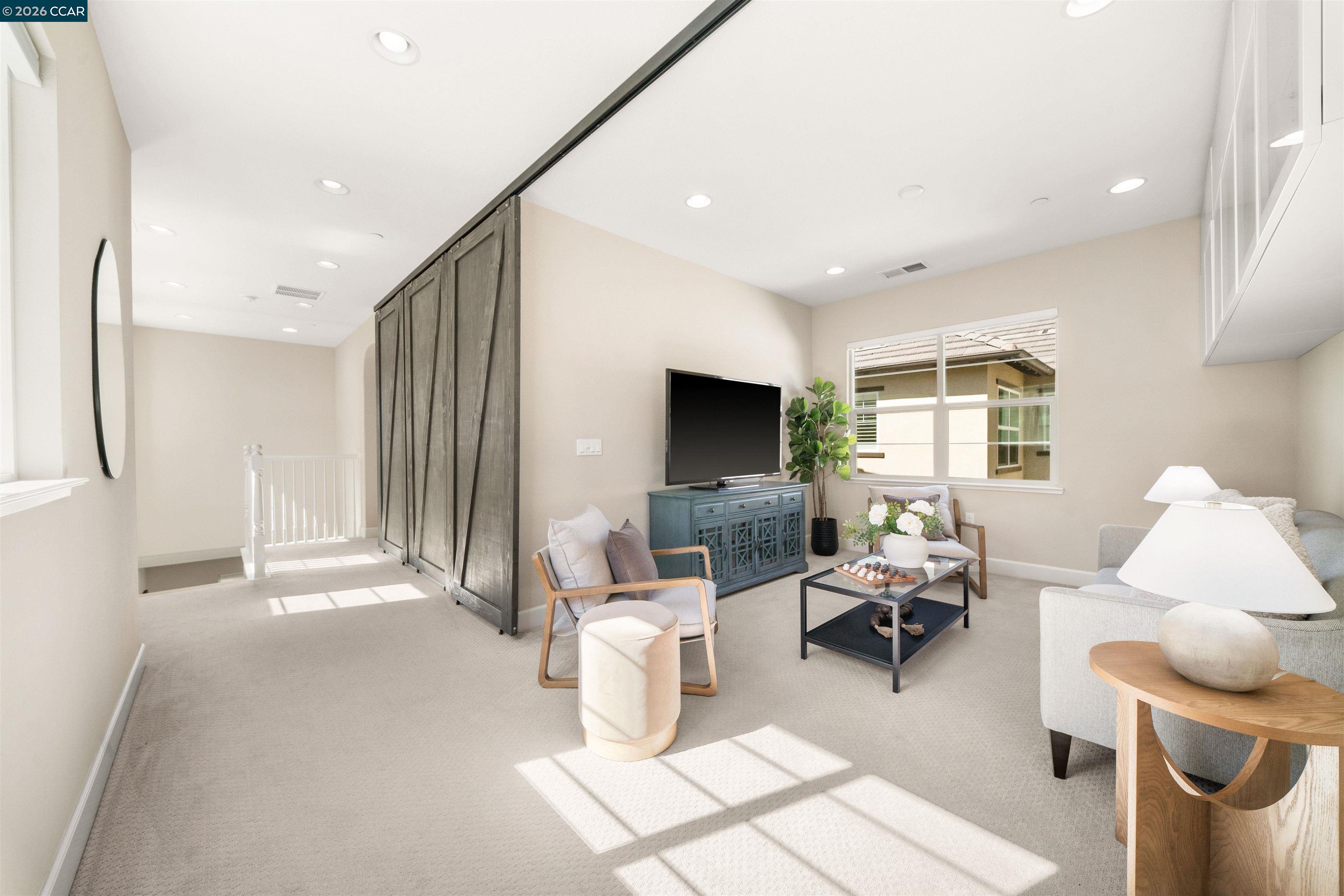 2026 Poinsettia Street San Ramon, CA 94582 - Photo 19 of 26 a living room with furniture and a flat screen tv