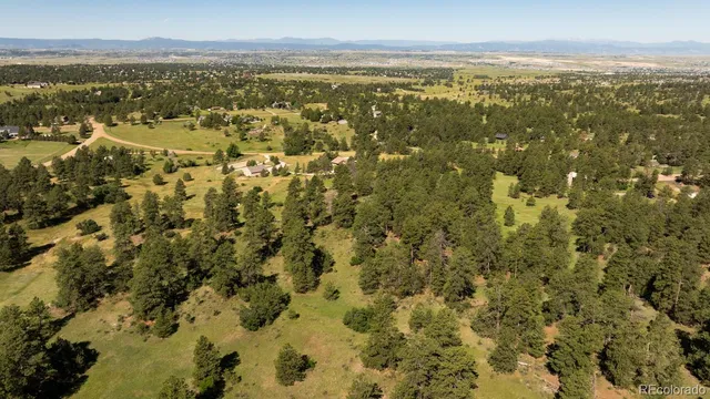 $890,000 | 10252 Pine Song Place, Parker, CO 80134