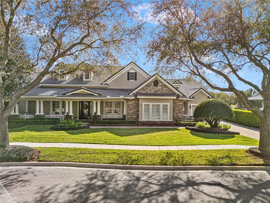 25840 Feather Ridge Lane Sorrento, FL 32776 - Photo 1 of 1 a front view of a house with swimming pool and yard