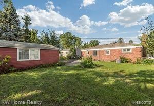 23124 Farmington Road Farmington, MI 48336 - Photo 41 of 42 Backyard Framed with Gardens.jpg