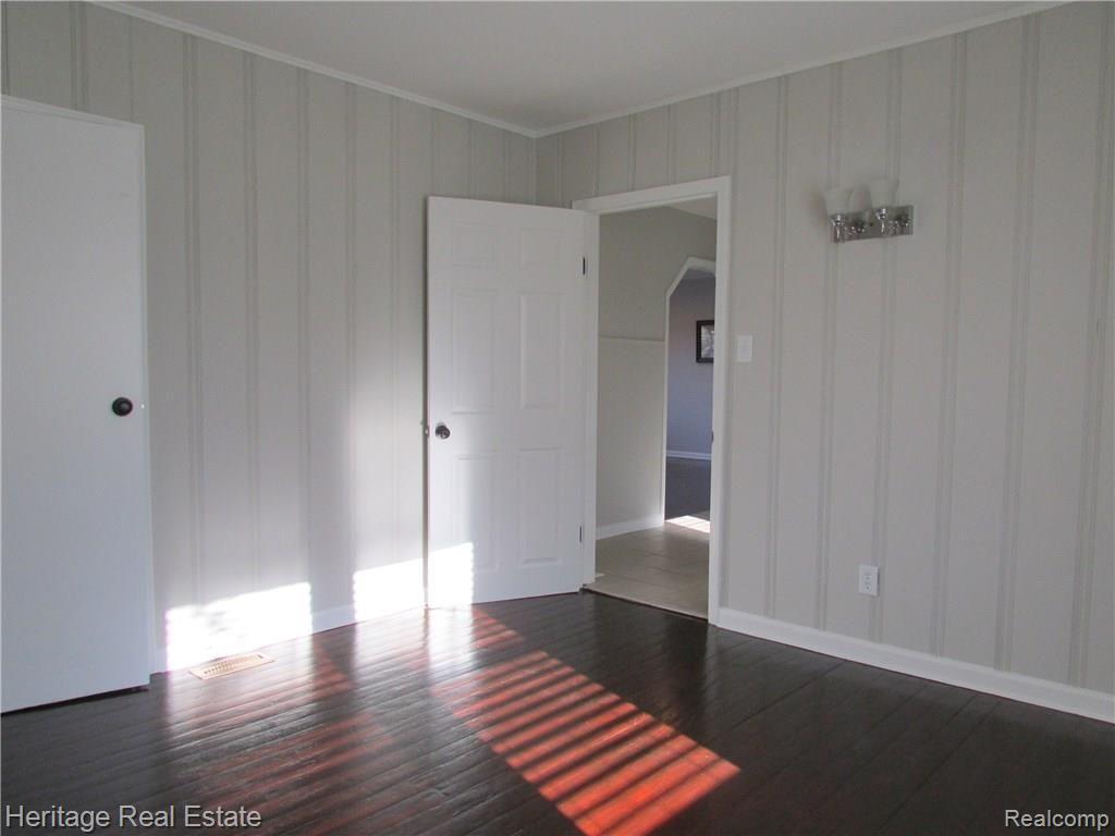 2358 Virginia Avenue Troy, MI 48083 - Photo 11 of 24 Fabulous freshly painted bedroom with beautifully refinished hardwood floors