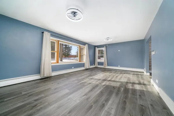 a bathroom with a sink a mirror and a vanity
