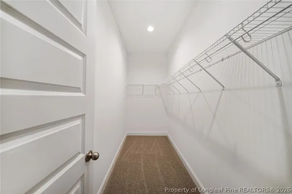 a view of a room with racks on the wall