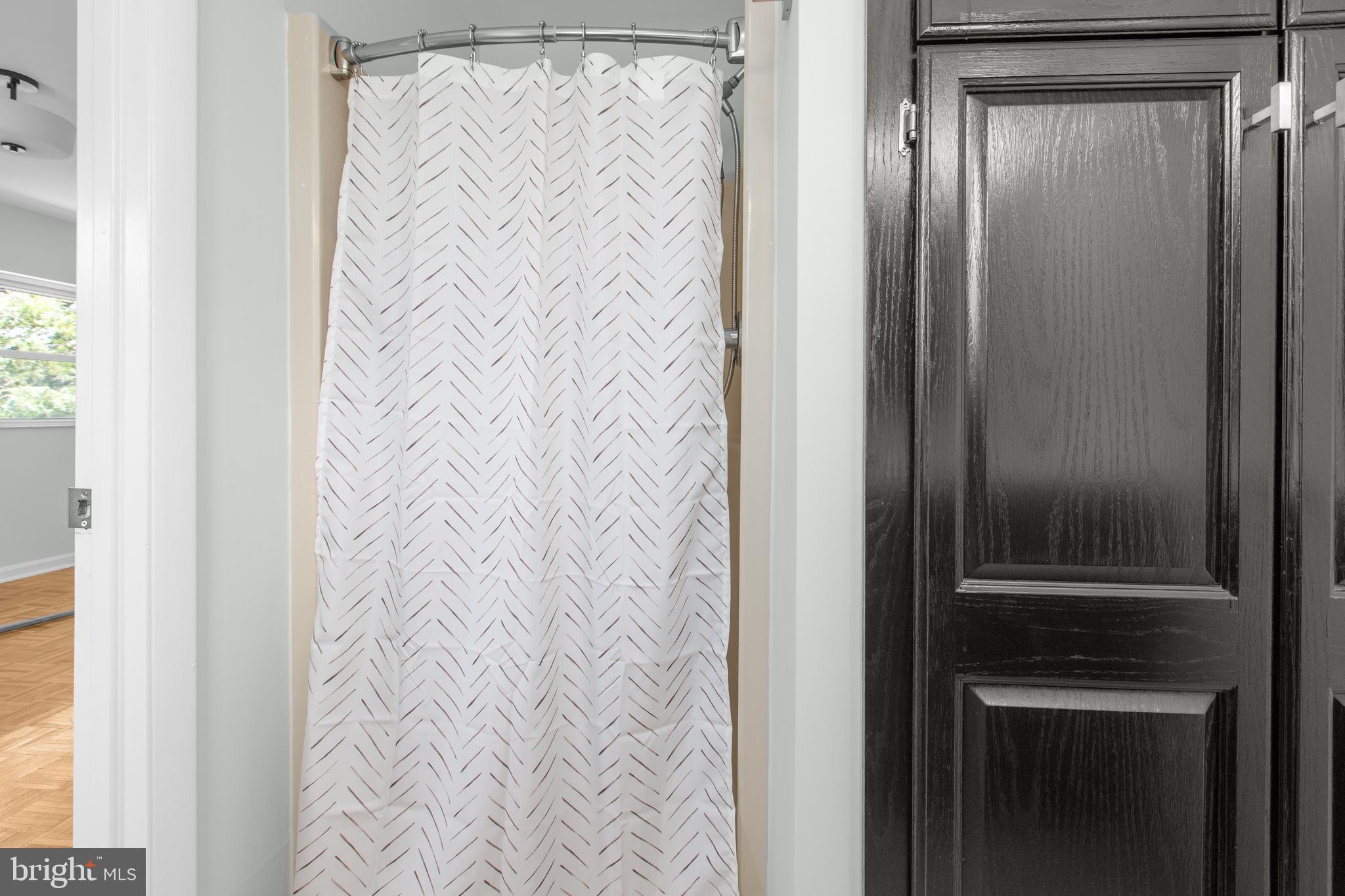 10827 Catharpin Road Spotsylvania, VA 22553 - Photo 29 of 39 a bathroom with a shower and a window
