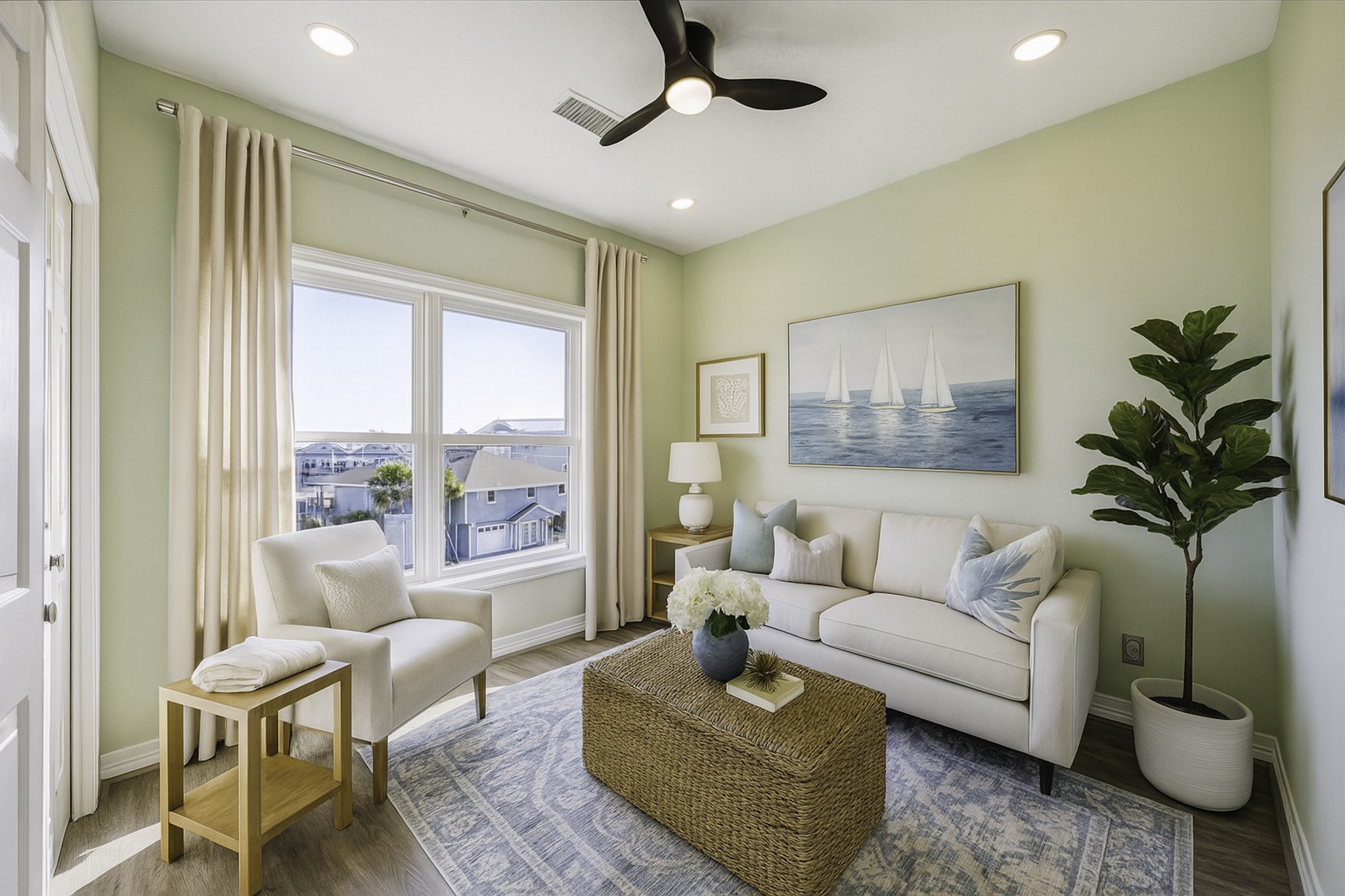 1322 Outrigger Street Tiki Island, TX 77554 - Photo 32 of 46 a living room with furniture and a large window