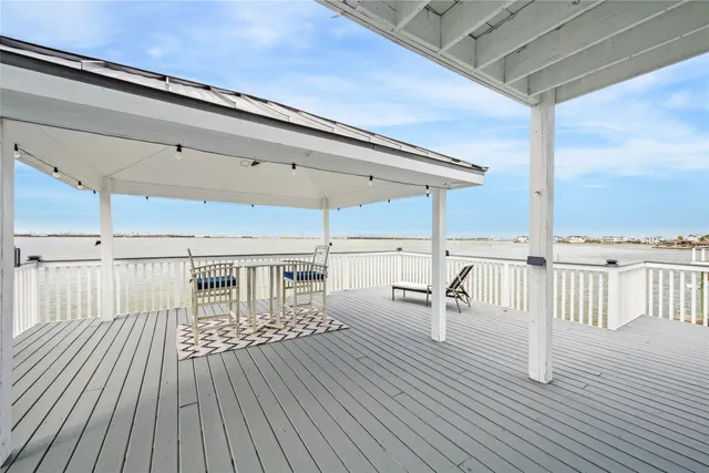 a dinning table and chairs in the balcony