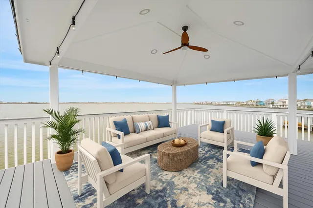 a living room with patio furniture