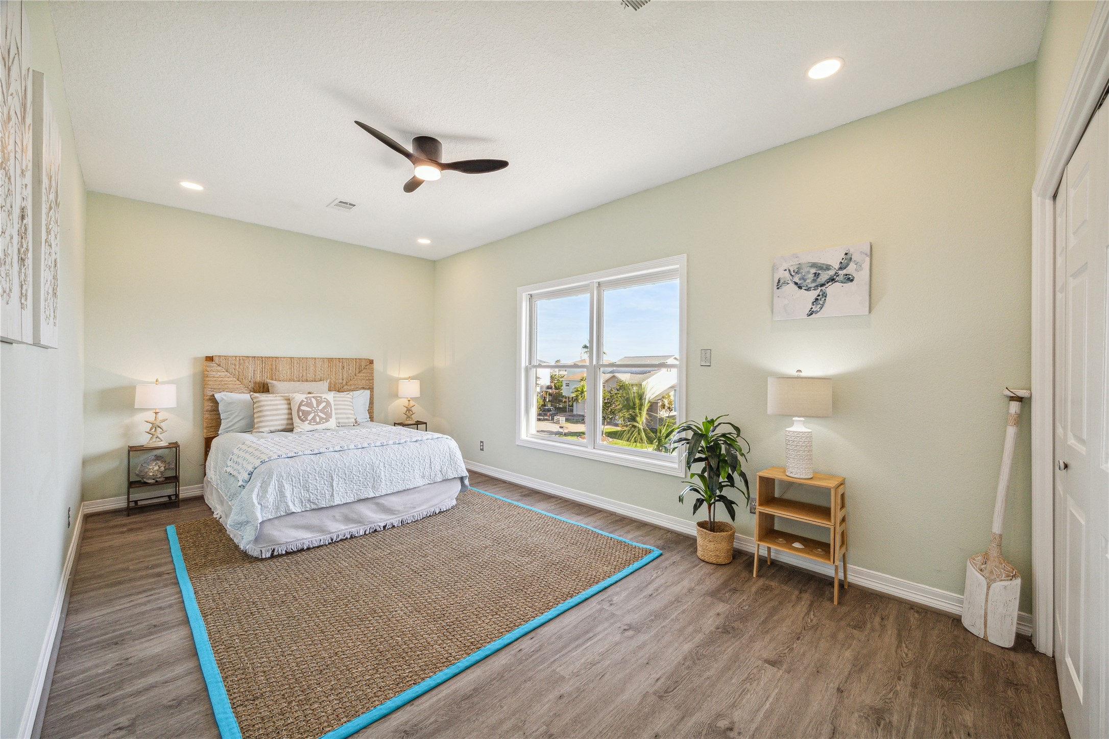 1322 Outrigger Street Tiki Island, TX 77554 - Photo 44 of 46 a bedroom with a bed and a chair