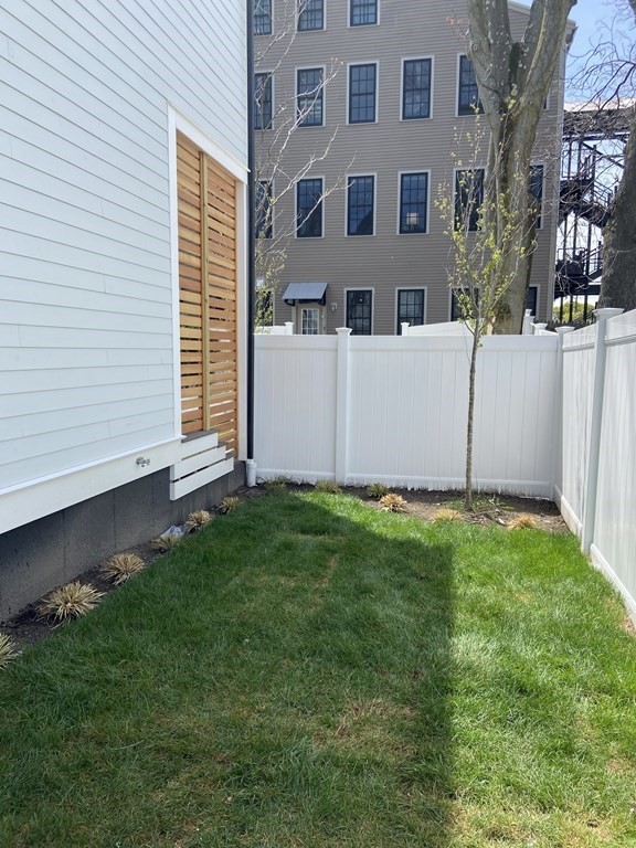 9 B Harrison Road, Unit 9B Somerville, MA 02144 - Photo 20 of 21 a view of backyard with large tree