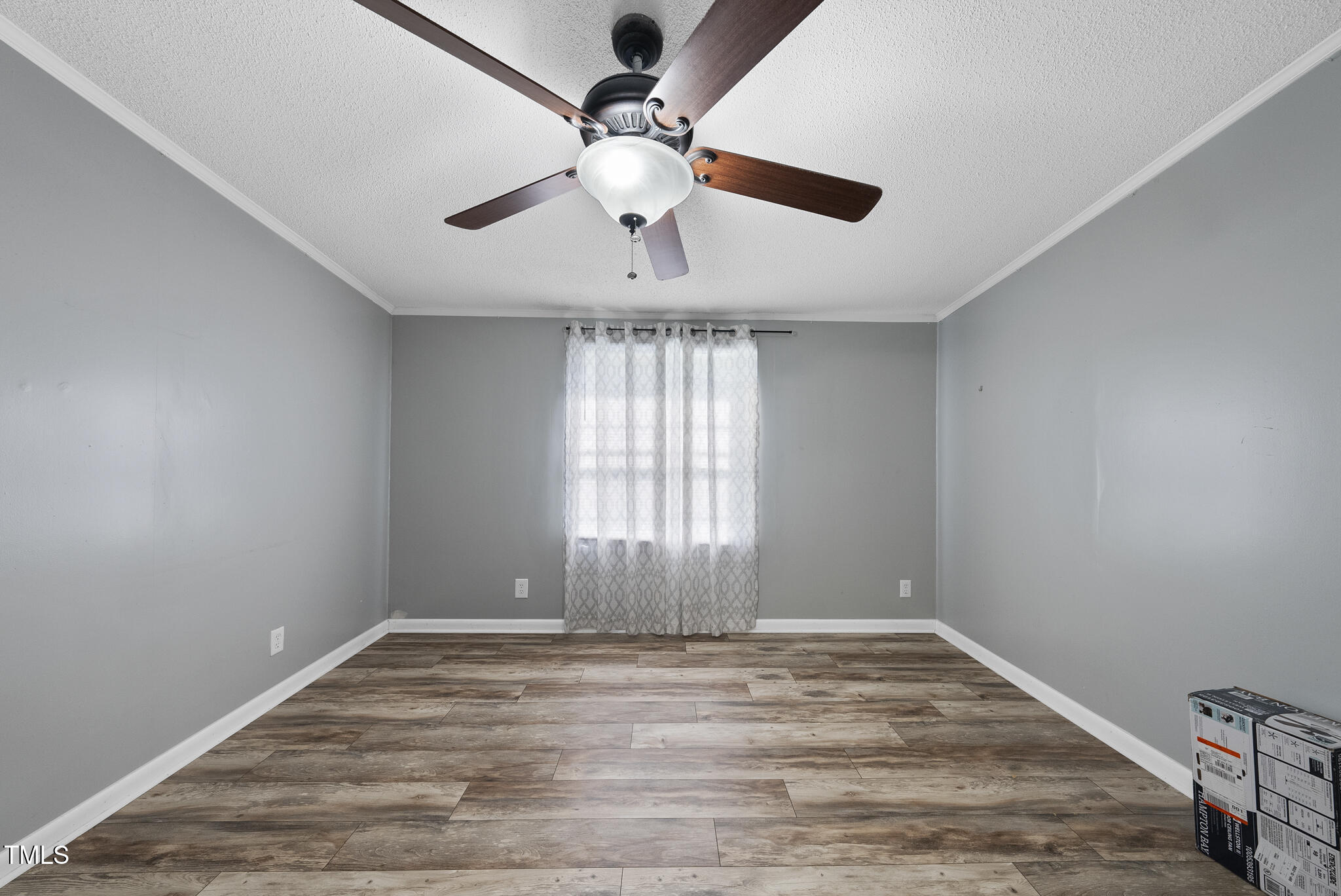 186 Saplin Branch Road Timberlake, NC 27583 - Photo 15 of 46 a view of an empty room with a window