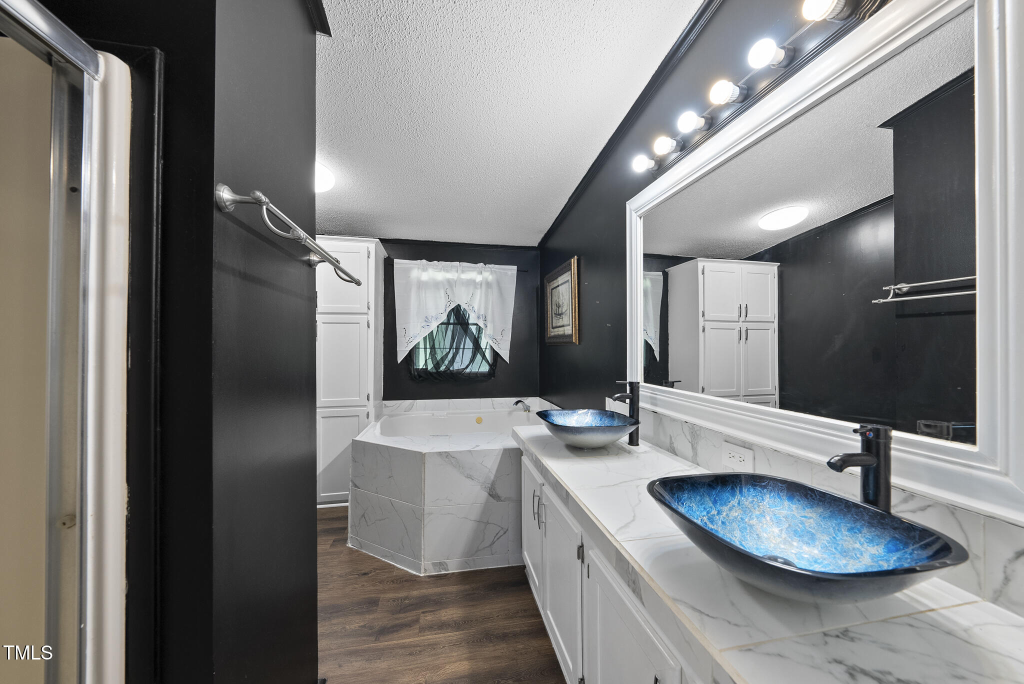 186 Saplin Branch Road Timberlake, NC 27583 - Photo 16 of 46 a room with furniture and a mirror