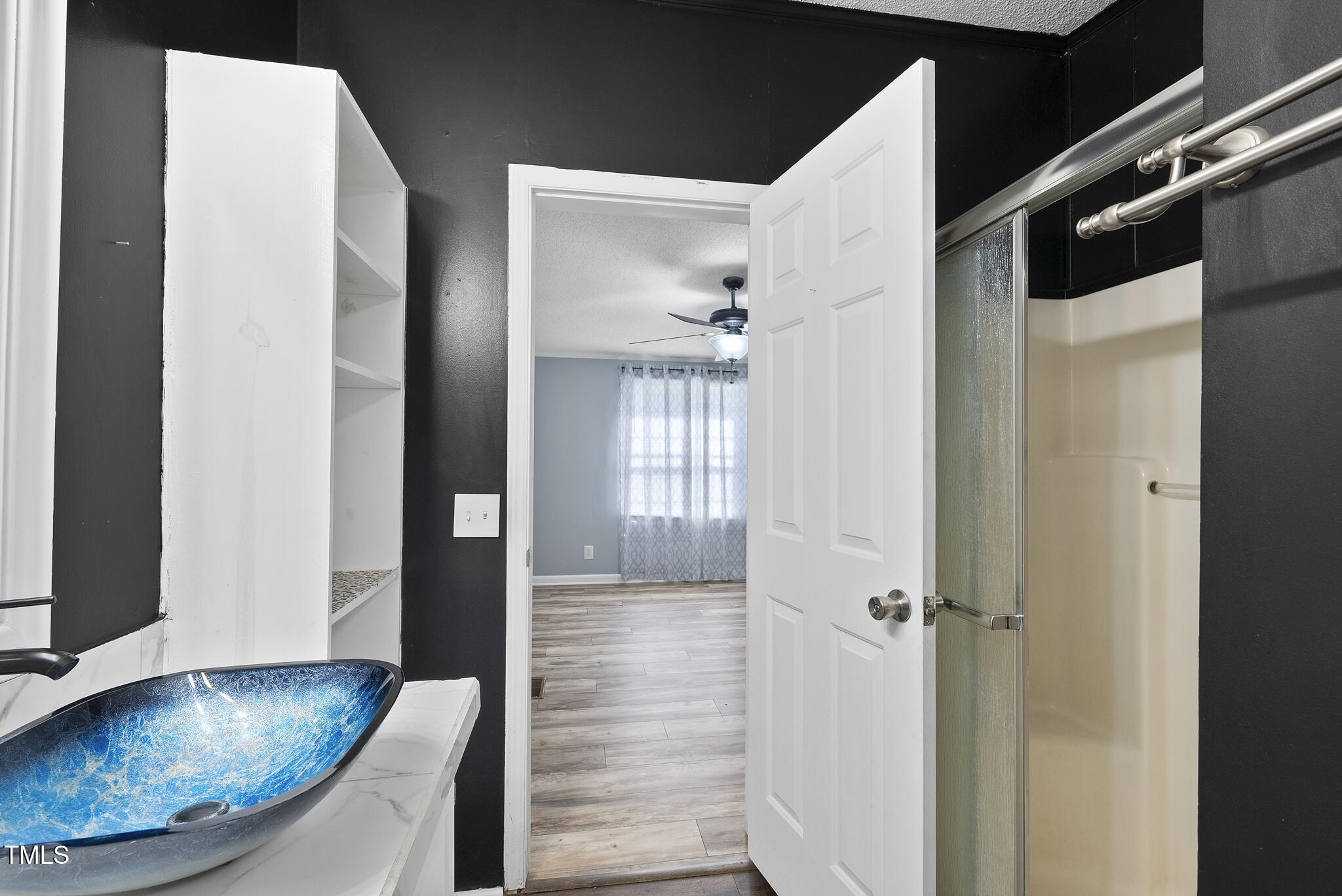 186 Saplin Branch Road Timberlake, NC 27583 - Photo 19 of 46 a view of a hallway with wooden floor and staircase