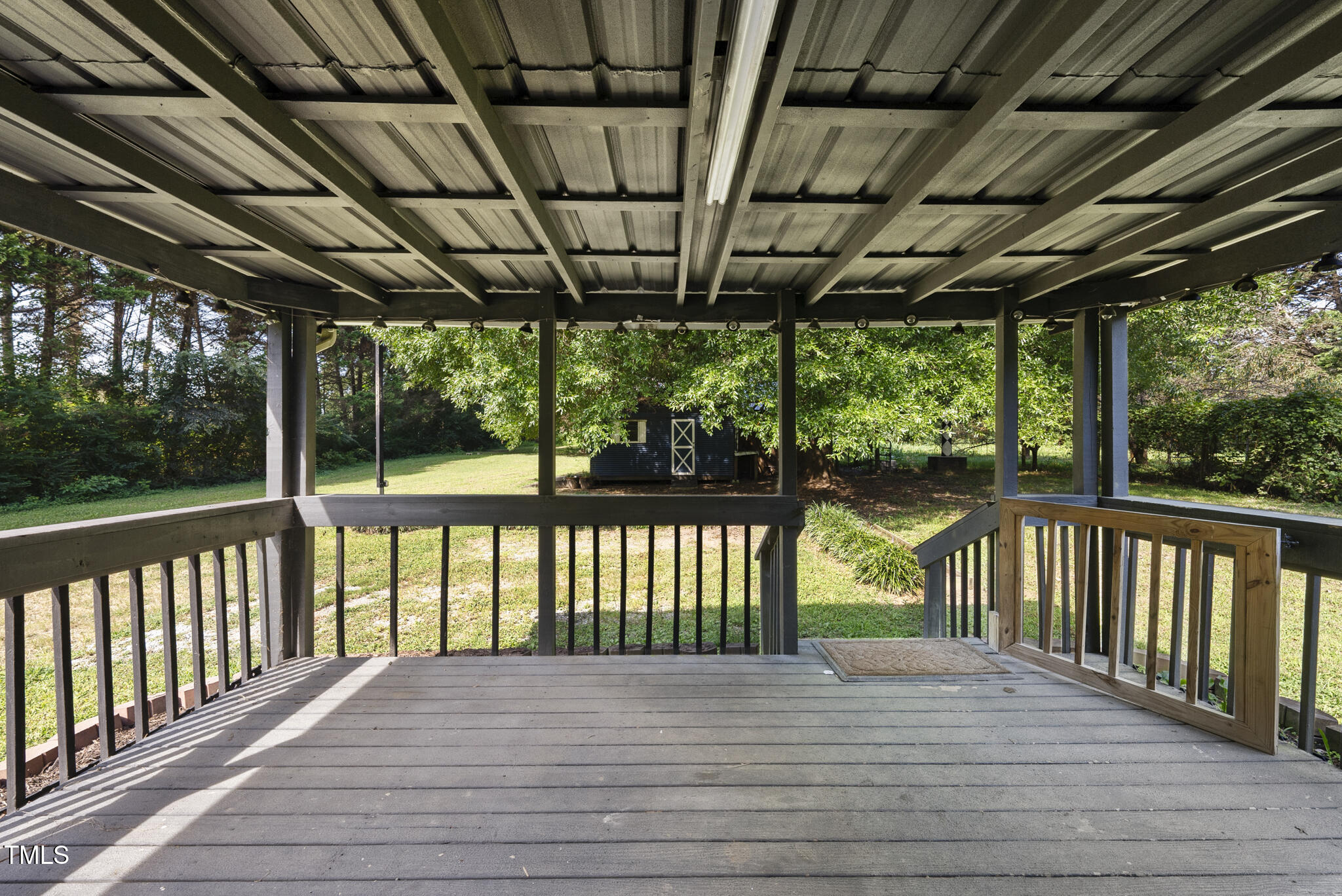 186 Saplin Branch Road Timberlake, NC 27583 - Photo 33 of 46 a view of porch with green trees in front