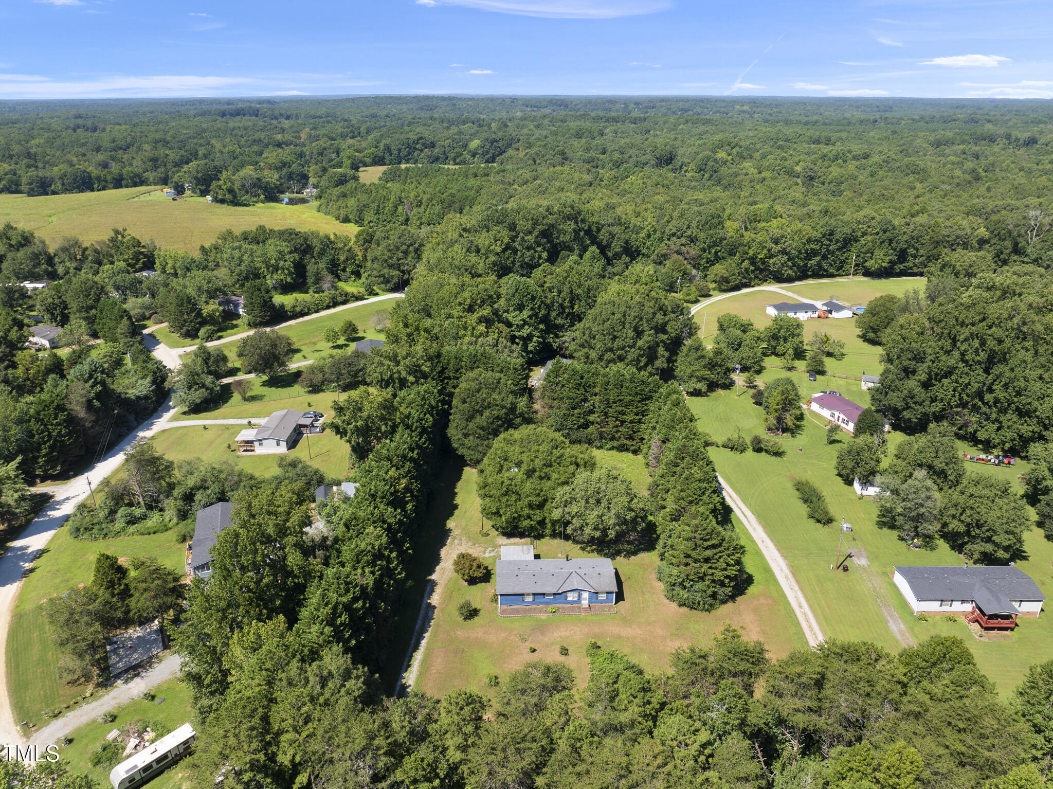 186 Saplin Branch Road Timberlake, NC 27583 - Photo 41 of 46 an aerial view of residential houses with outdoor space and trees