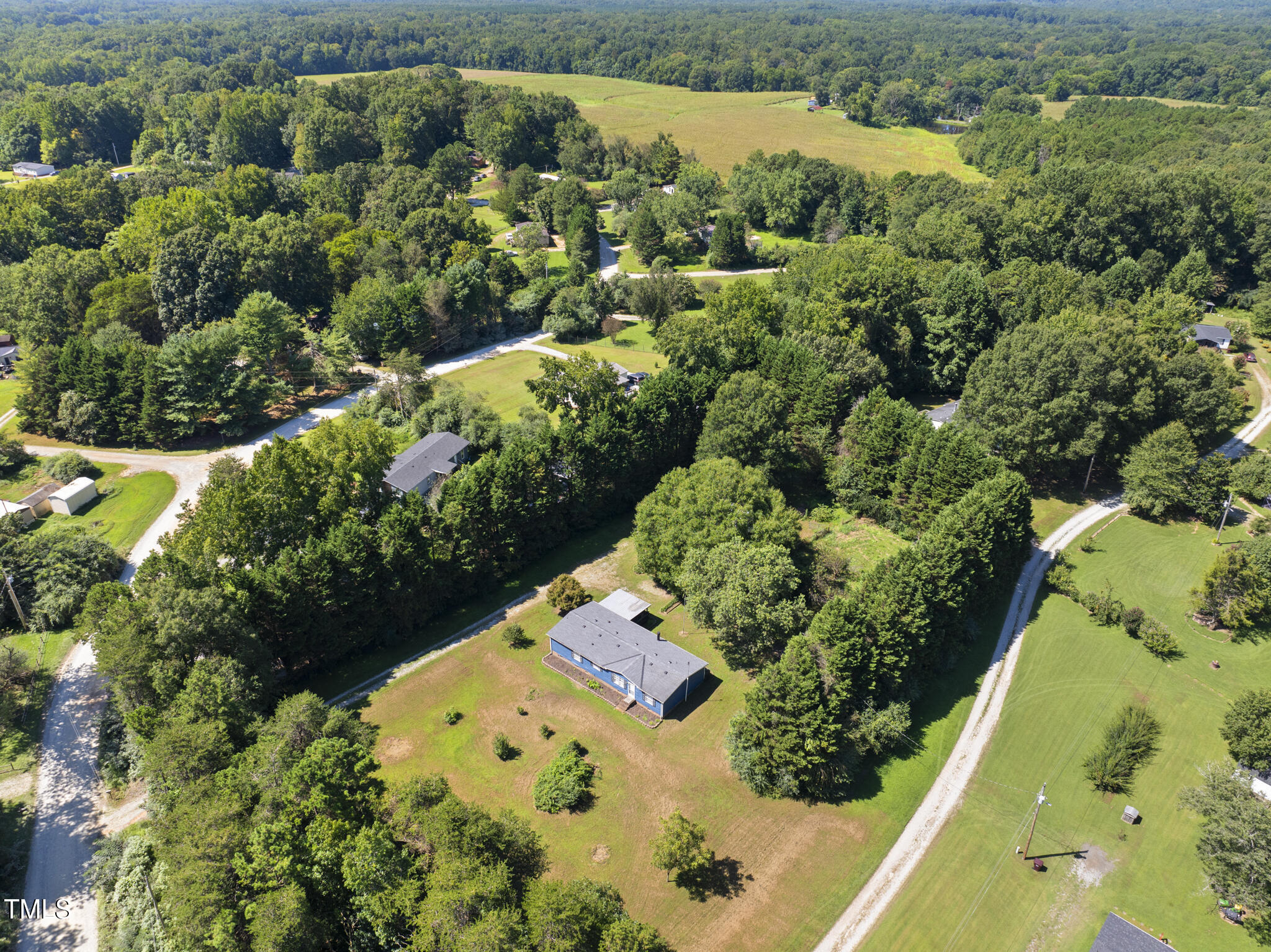 186 Saplin Branch Road Timberlake, NC 27583 - Photo 46 of 46 an aerial view of a house with a yard