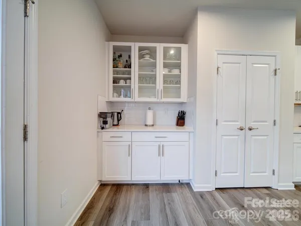 a bathroom with a sink and a window
