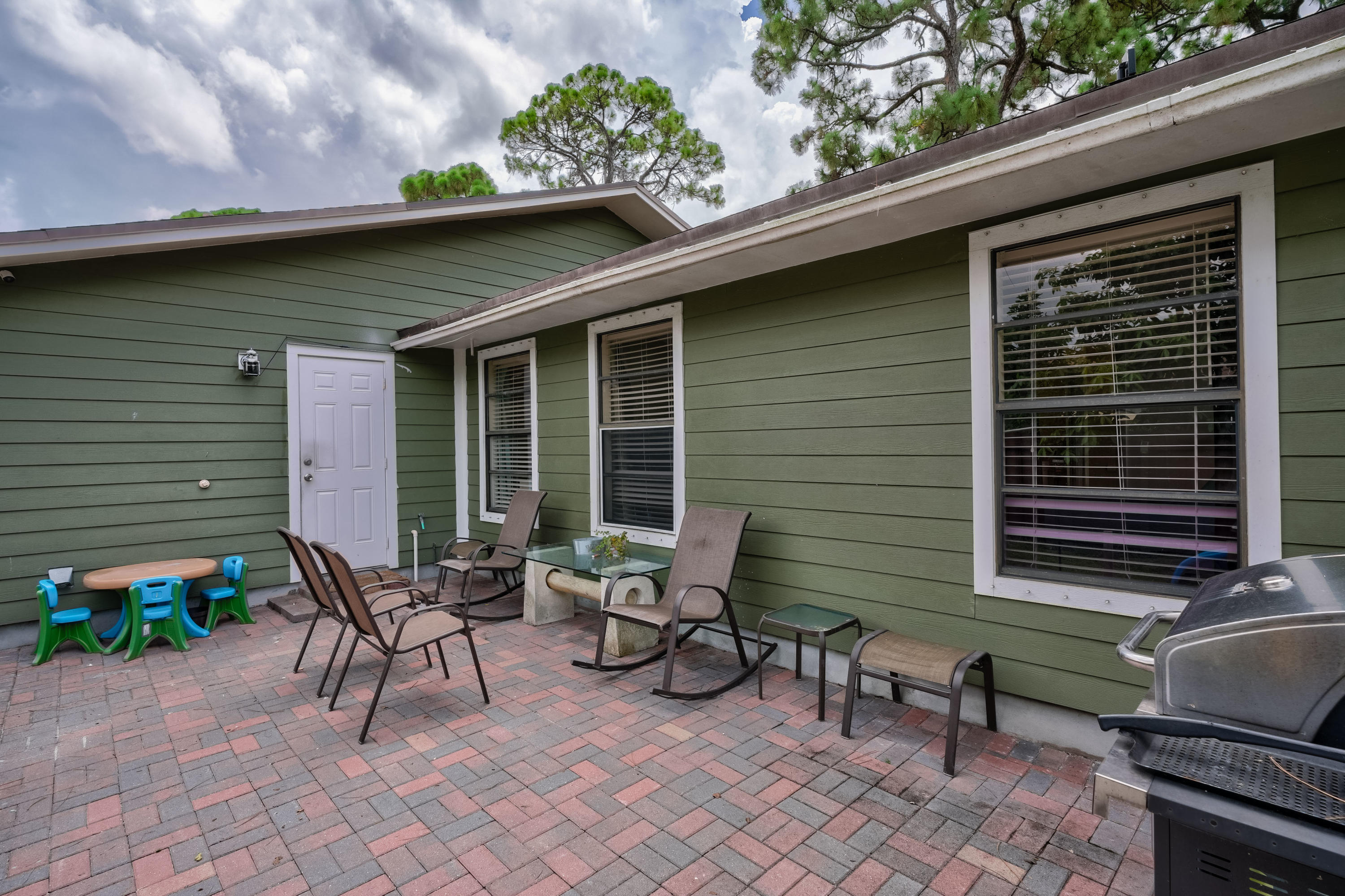 6120 Wolfe Street Jupiter, FL 33458 - Photo 27 of 55 A private patio that invites comfort